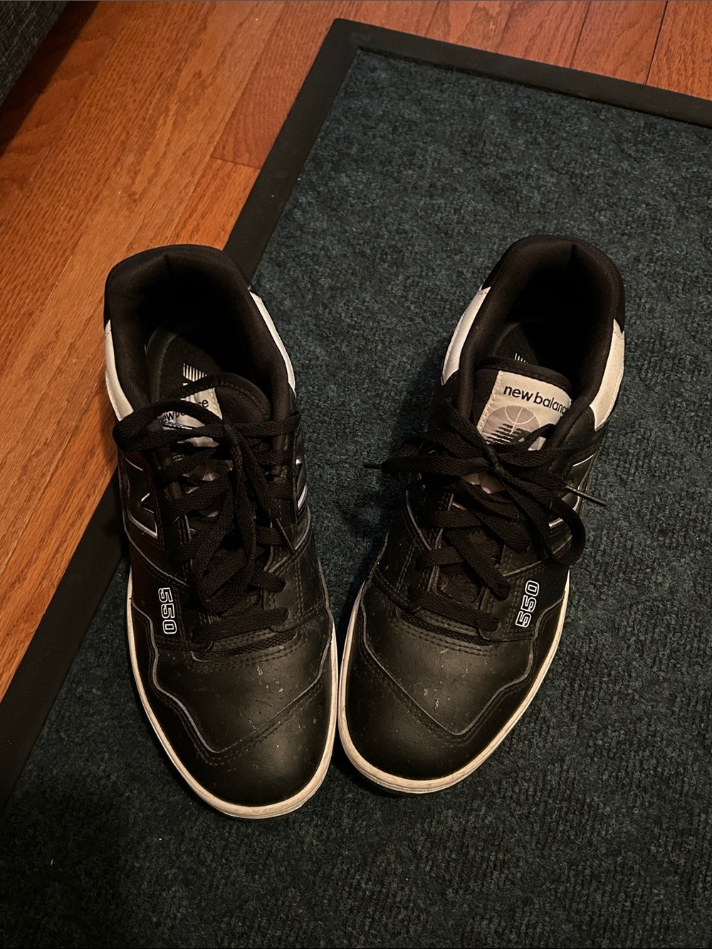 New Balance 550 in the "Panda" (Black/White/Sea Salt) colorway size 10